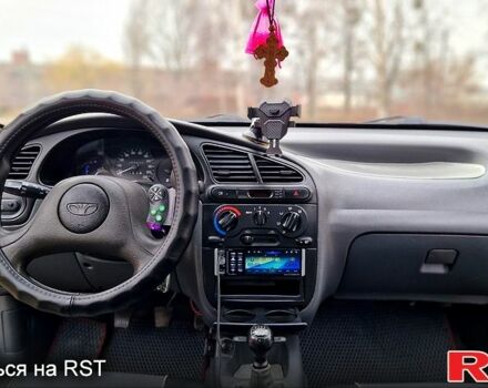 Серый Дэу Ланос, объемом двигателя 1.5 л и пробегом 205 тыс. км за 3100 $, фото 12 на Automoto.ua