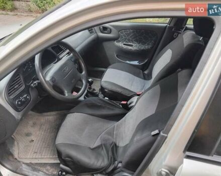 Сірий Деу Ланос, об'ємом двигуна 1.6 л та пробігом 134 тис. км за 2950 $, фото 5 на Automoto.ua