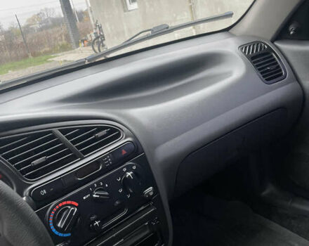 Серый Дэу Ланос, объемом двигателя 1.5 л и пробегом 205 тыс. км за 2300 $, фото 12 на Automoto.ua