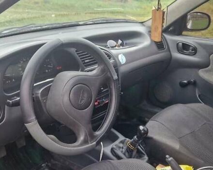 Сірий Деу Ланос, об'ємом двигуна 1.5 л та пробігом 493 тис. км за 2250 $, фото 3 на Automoto.ua