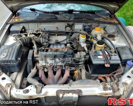 Сірий Деу Ланос, об'ємом двигуна 1.5 л та пробігом 400 тис. км за 1000 $, фото 8 на Automoto.ua