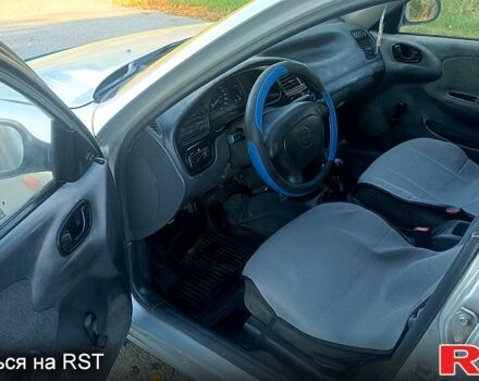 Серый Дэу Ланос, объемом двигателя 1.5 л и пробегом 333 тыс. км за 1400 $, фото 6 на Automoto.ua