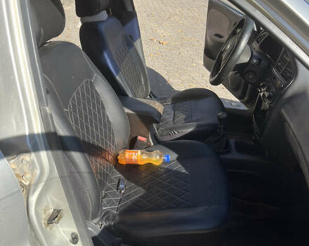 Деу Ланос 2006 у Жмеренке на Automoto.ua Сірий Деу Ланос, об'ємом двигуна 1.3 л та пробігом 179 тис. км за 1650 $, фото 13 на Automoto.ua