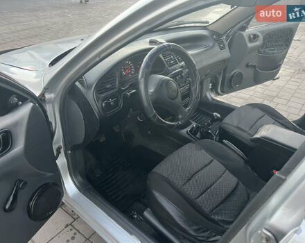 Серый Дэу Ланос, объемом двигателя 1.5 л и пробегом 210 тыс. км за 2100 $, фото 7 на Automoto.ua