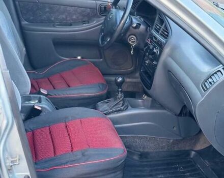 Сірий Деу Ланос, об'ємом двигуна 1.5 л та пробігом 150 тис. км за 1950 $, фото 7 на Automoto.ua