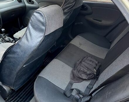 Серый Дэу Ланос, объемом двигателя 1.5 л и пробегом 220 тыс. км за 1900 $, фото 5 на Automoto.ua