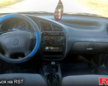 Серый Дэу Ланос, объемом двигателя 1.5 л и пробегом 333 тыс. км за 1400 $, фото 4 на Automoto.ua