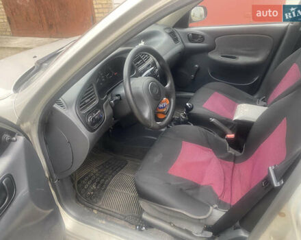 Серый Дэу Ланос, объемом двигателя 1.5 л и пробегом 200 тыс. км за 1500 $, фото 7 на Automoto.ua