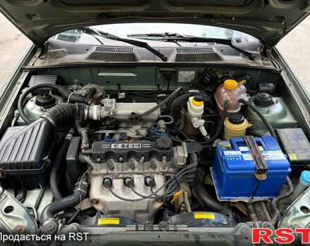 Серый Дэу Ланос, объемом двигателя 1.5 л и пробегом 170 тыс. км за 1950 $, фото 7 на Automoto.ua