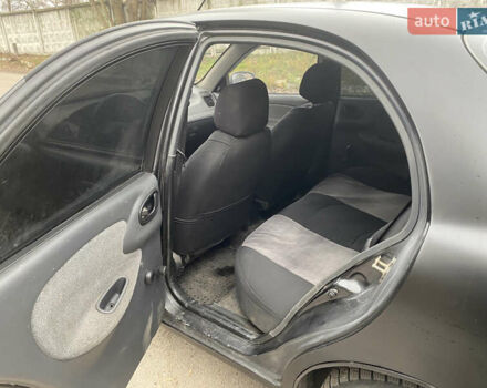 Серый Дэу Ланос, объемом двигателя 1.5 л и пробегом 210 тыс. км за 1450 $, фото 4 на Automoto.ua