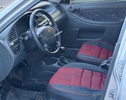 Сірий Деу Ланос, об'ємом двигуна 1.5 л та пробігом 150 тис. км за 1950 $, фото 2 на Automoto.ua