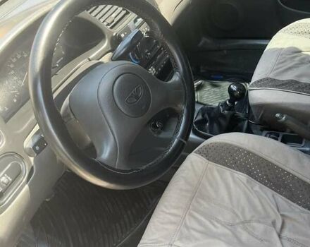 Серый Дэу Ланос, объемом двигателя 1.5 л и пробегом 300 тыс. км за 2350 $, фото 4 на Automoto.ua