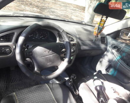 Серый Дэу Ланос, объемом двигателя 1.5 л и пробегом 184 тыс. км за 3500 $, фото 3 на Automoto.ua