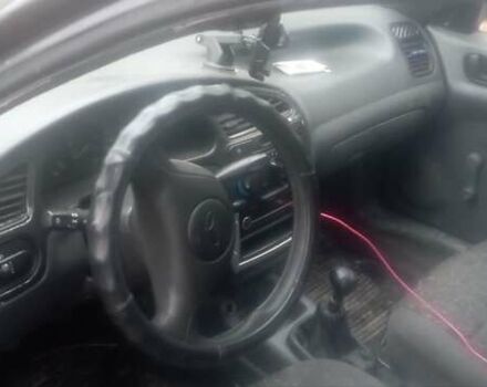 Серый Дэу Ланос, объемом двигателя 1.52 л и пробегом 215 тыс. км за 900 $, фото 5 на Automoto.ua