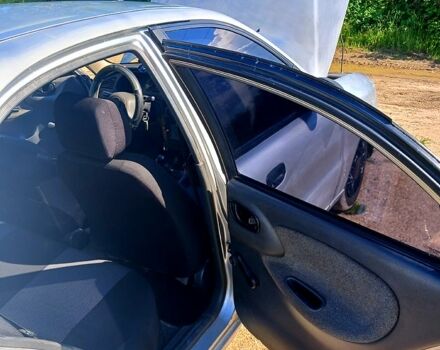 Серый Дэу Ланос, объемом двигателя 1.5 л и пробегом 440 тыс. км за 2000 $, фото 4 на Automoto.ua