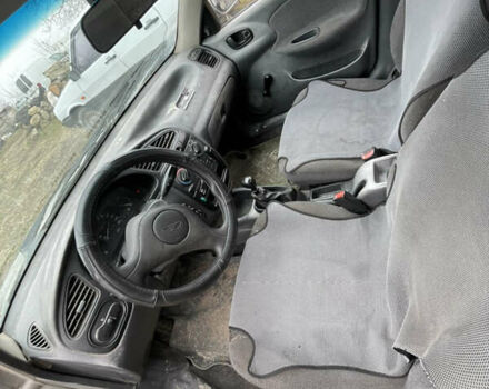 Серый Дэу Ланос, объемом двигателя 0 л и пробегом 226 тыс. км за 950 $, фото 4 на Automoto.ua