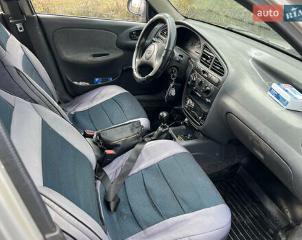 Серый Дэу Ланос, объемом двигателя 1.5 л и пробегом 207 тыс. км за 1400 $, фото 11 на Automoto.ua