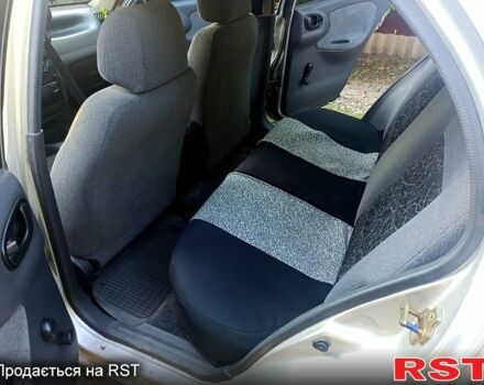 Серый Дэу Ланос, объемом двигателя 1.5 л и пробегом 306 тыс. км за 1950 $, фото 6 на Automoto.ua