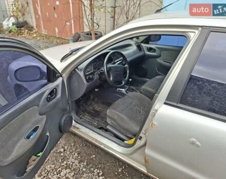 Серый Дэу Ланос, объемом двигателя 1.6 л и пробегом 337 тыс. км за 1100 $, фото 4 на Automoto.ua