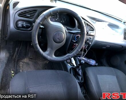 Сірий Деу Ланос, об'ємом двигуна 1.5 л та пробігом 380 тис. км за 1350 $, фото 2 на Automoto.ua