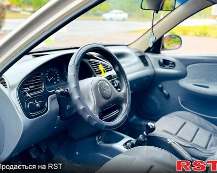 Дэу Ланос 2006 в Павлограде на Automoto.ua Серый Дэу Ланос, объемом двигателя 1.5 л и пробегом 200 тыс. км за 1900 $, фото 3 на Automoto.ua