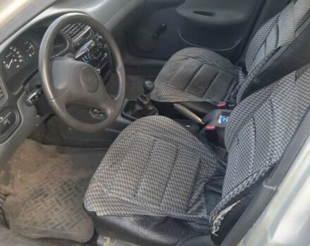 Серый Дэу Ланос, объемом двигателя 1.5 л и пробегом 63 тыс. км за 4099 $, фото 4 на Automoto.ua