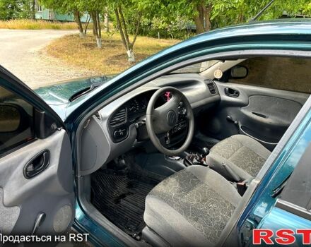 Серый Дэу Ланос, объемом двигателя 1.5 л и пробегом 200 тыс. км за 1400 $, фото 8 на Automoto.ua