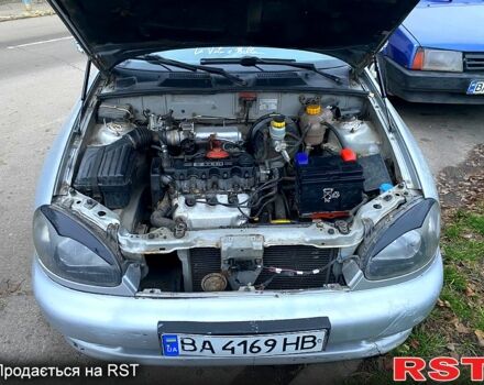 Серый Дэу Ланос, объемом двигателя 1.5 л и пробегом 200 тыс. км за 1700 $, фото 2 на Automoto.ua