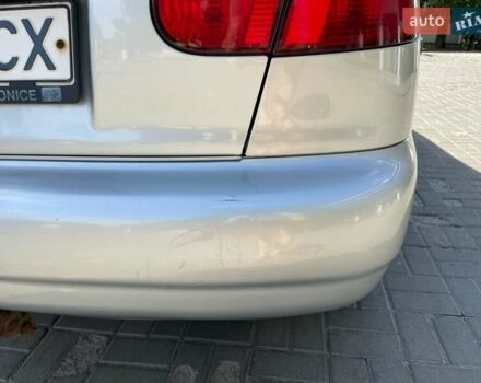 Серый Дэу Ланос, объемом двигателя 1.6 л и пробегом 228 тыс. км за 2900 $, фото 45 на Automoto.ua