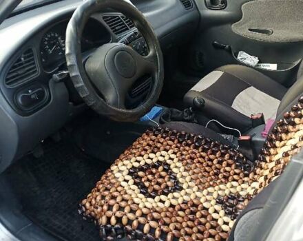 Серый Дэу Ланос, объемом двигателя 1.5 л и пробегом 144 тыс. км за 2200 $, фото 2 на Automoto.ua