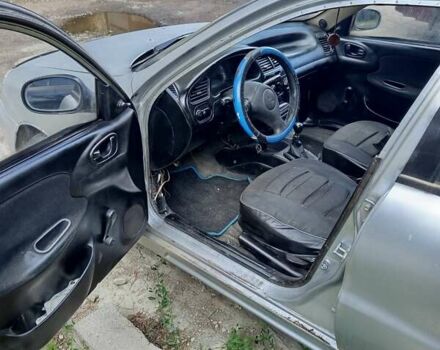 Сірий Деу Ланос, об'ємом двигуна 1.5 л та пробігом 220 тис. км за 750 $, фото 6 на Automoto.ua