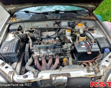 Сірий Деу Ланос, об'ємом двигуна 1.5 л та пробігом 400 тис. км за 1000 $, фото 6 на Automoto.ua