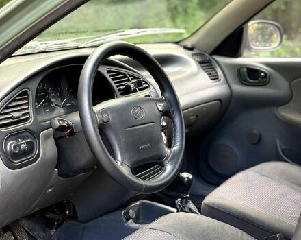 Серый Дэу Ланос, объемом двигателя 1.5 л и пробегом 170 тыс. км за 1950 $, фото 4 на Automoto.ua