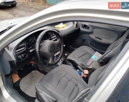 Серый Дэу Ланос, объемом двигателя 1.5 л и пробегом 210 тыс. км за 1800 $, фото 3 на Automoto.ua