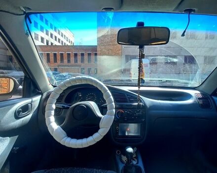 Серый Дэу Ланос, объемом двигателя 1.5 л и пробегом 300 тыс. км за 1300 $, фото 3 на Automoto.ua