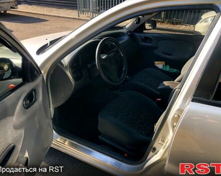 Серый Дэу Ланос, объемом двигателя 1.5 л и пробегом 273 тыс. км за 3000 $, фото 7 на Automoto.ua