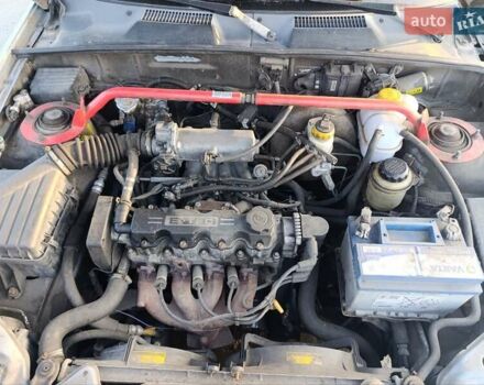 Серый Дэу Ланос, объемом двигателя 1.5 л и пробегом 270 тыс. км за 1211 $, фото 4 на Automoto.ua