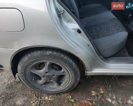 Сірий Деу Ланос, об'ємом двигуна 1.5 л та пробігом 320 тис. км за 1500 $, фото 1 на Automoto.ua