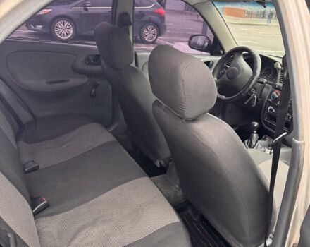 Сірий Деу Ланос, об'ємом двигуна 1.39 л та пробігом 314 тис. км за 1500 $, фото 10 на Automoto.ua