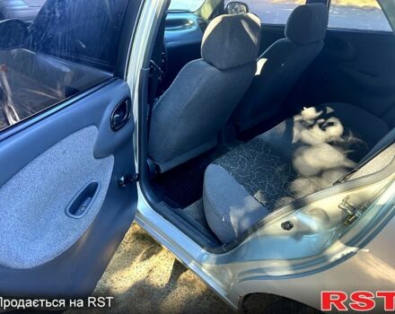 Сірий Деу Ланос, об'ємом двигуна 1.4 л та пробігом 248 тис. км за 1400 $, фото 8 на Automoto.ua