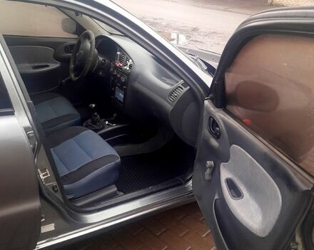 Серый Дэу Ланос, объемом двигателя 1.5 л и пробегом 237 тыс. км за 1950 $, фото 7 на Automoto.ua