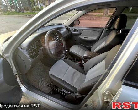 Серый Дэу Ланос, объемом двигателя 1.5 л и пробегом 300 тыс. км за 2150 $, фото 5 на Automoto.ua