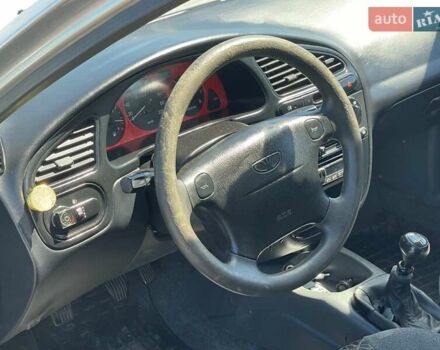 Серый Дэу Ланос, объемом двигателя 1.5 л и пробегом 290 тыс. км за 2500 $, фото 37 на Automoto.ua