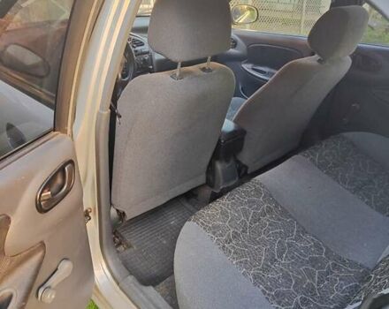 Серый Дэу Ланос, объемом двигателя 1.4 л и пробегом 239 тыс. км за 2100 $, фото 2 на Automoto.ua