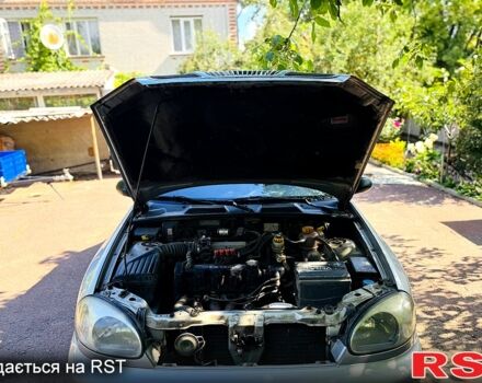 Серый Дэу Ланос, объемом двигателя 1.5 л и пробегом 167 тыс. км за 2800 $, фото 8 на Automoto.ua