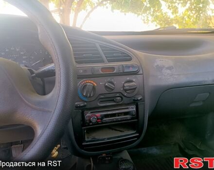 Серый Дэу Ланос, объемом двигателя 1.5 л и пробегом 200 тыс. км за 1150 $, фото 4 на Automoto.ua