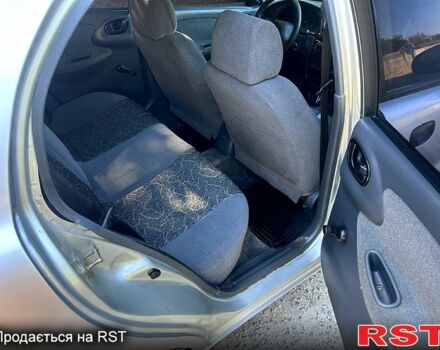 Сірий Деу Ланос, об'ємом двигуна 1.4 л та пробігом 248 тис. км за 1400 $, фото 9 на Automoto.ua