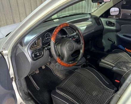 Серый Дэу Ланос, объемом двигателя 1.6 л и пробегом 160 тыс. км за 2600 $, фото 9 на Automoto.ua