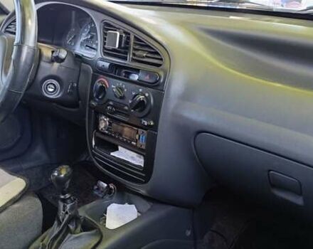 Сірий Деу Ланос, об'ємом двигуна 1.3 л та пробігом 178 тис. км за 1500 $, фото 12 на Automoto.ua