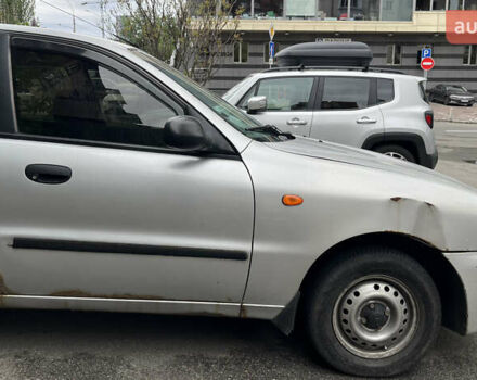 Сірий Деу Ланос, об'ємом двигуна 1.5 л та пробігом 271 тис. км за 1100 $, фото 4 на Automoto.ua